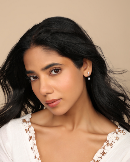 Model wearing Nadora Nove diamond drop earring